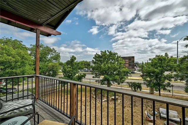 a view of a balcony with an outdoor space