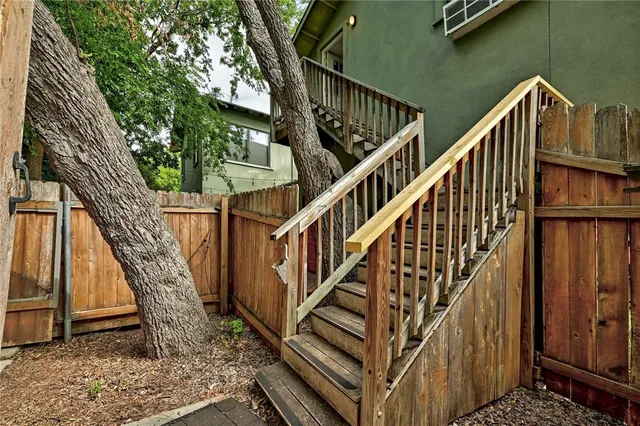 a view of entryway with wooden floor