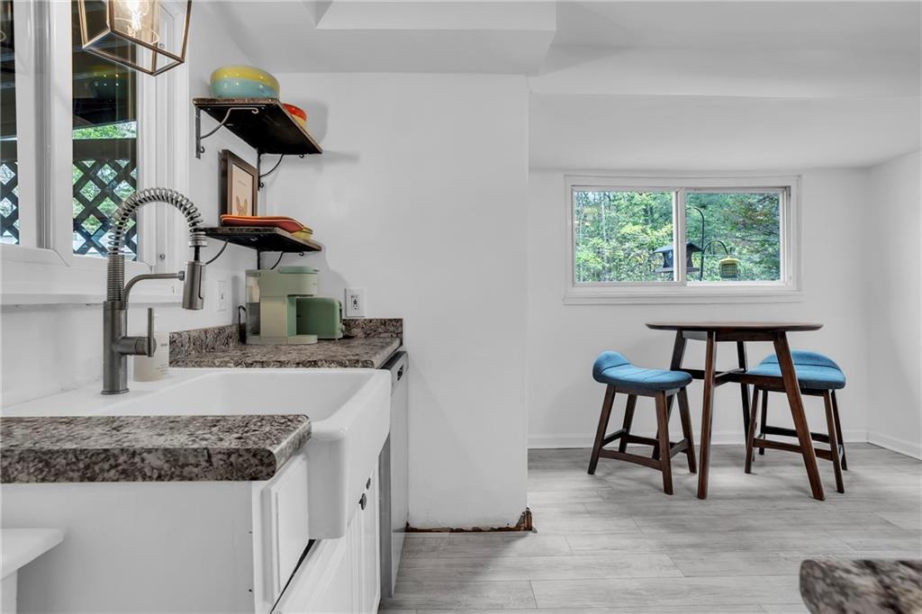 215 Harshaville Road Clinton, PA 15026 - Photo 5 of 30 a kitchen with kitchen island stainless steel appliances a sink and a table