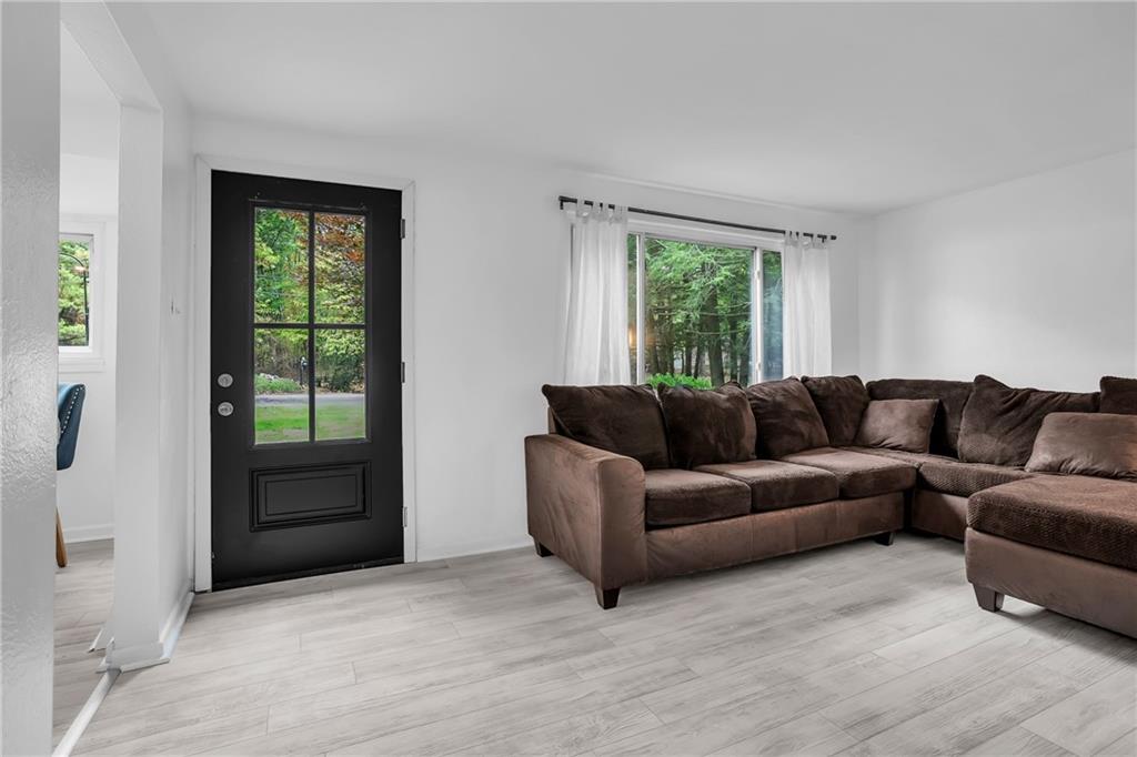 215 Harshaville Road Clinton, PA 15026 - Photo 8 of 30 a living room with furniture and a window