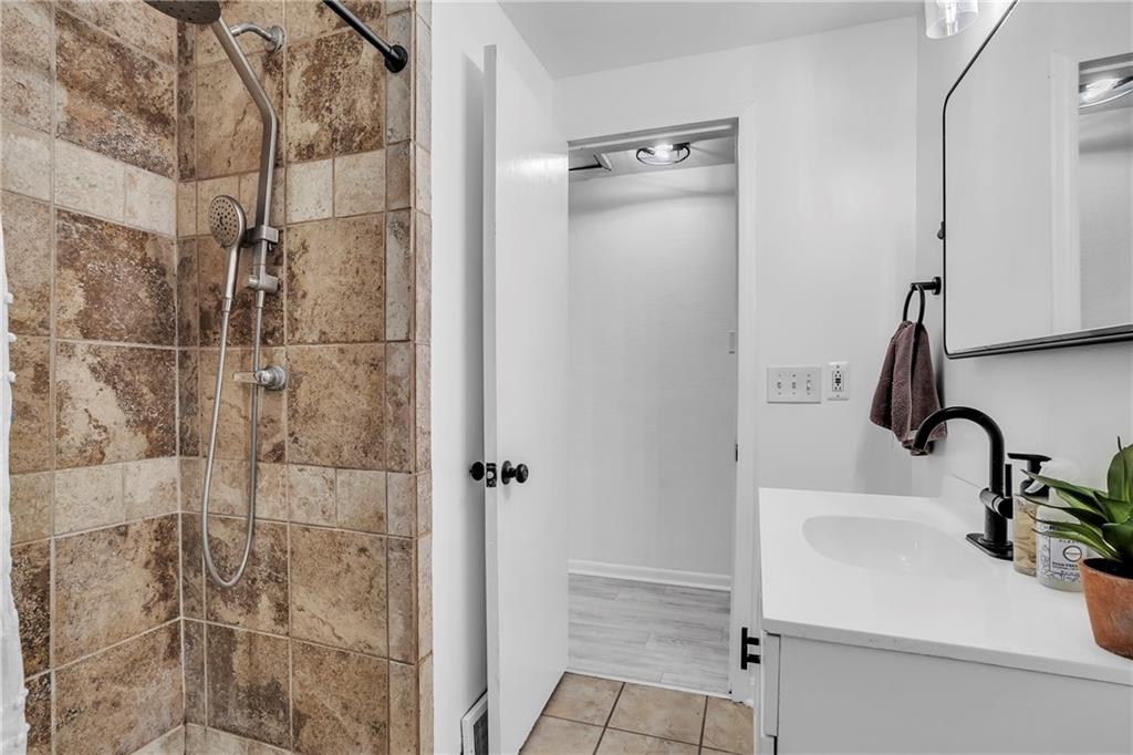 215 Harshaville Road Clinton, PA 15026 - Photo 10 of 30 a bathroom with a sink and a shower