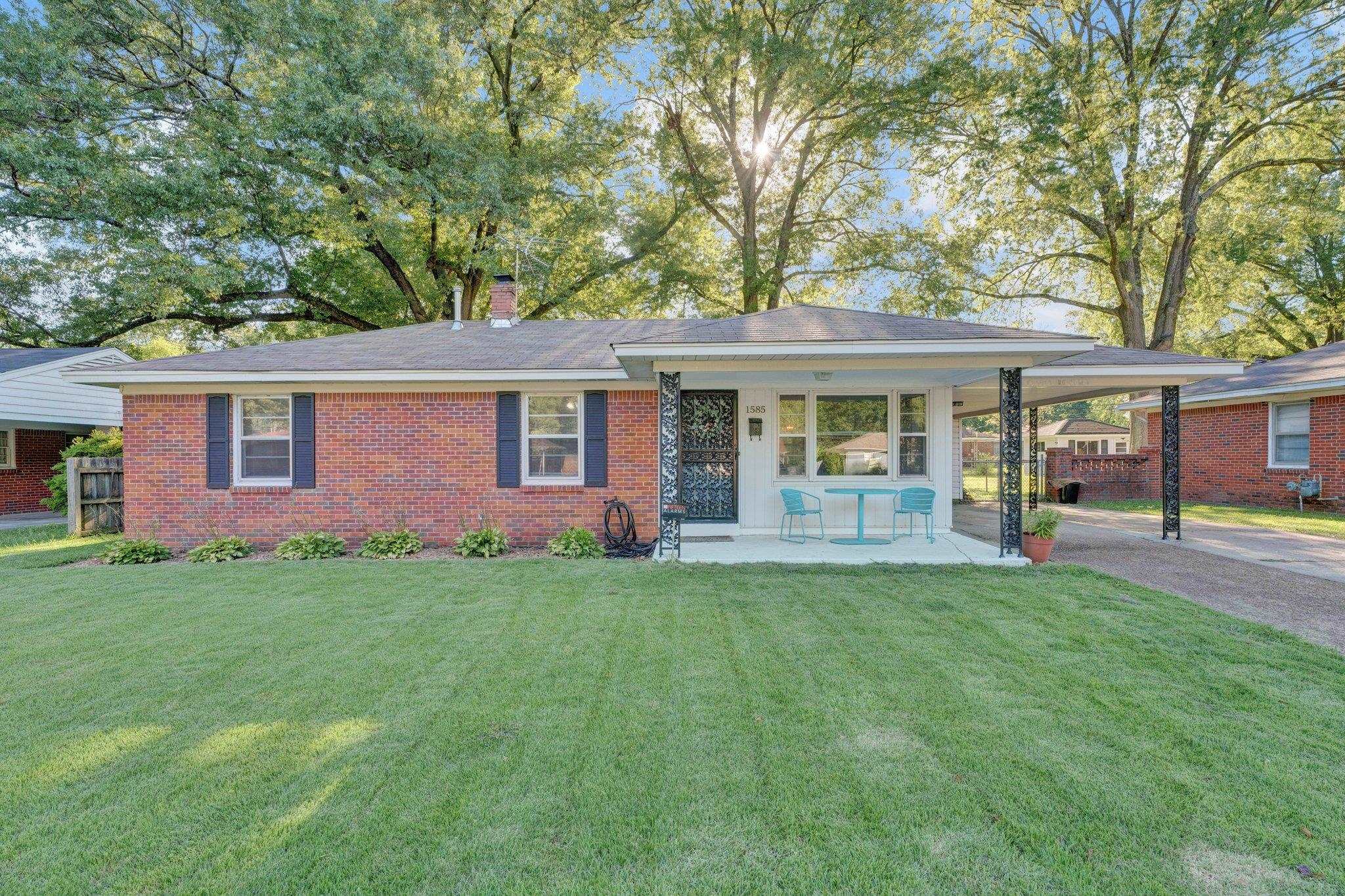 1585 Dearing Road Memphis, TN 38117 - Photo 1 of 34 front view of a house with a yard