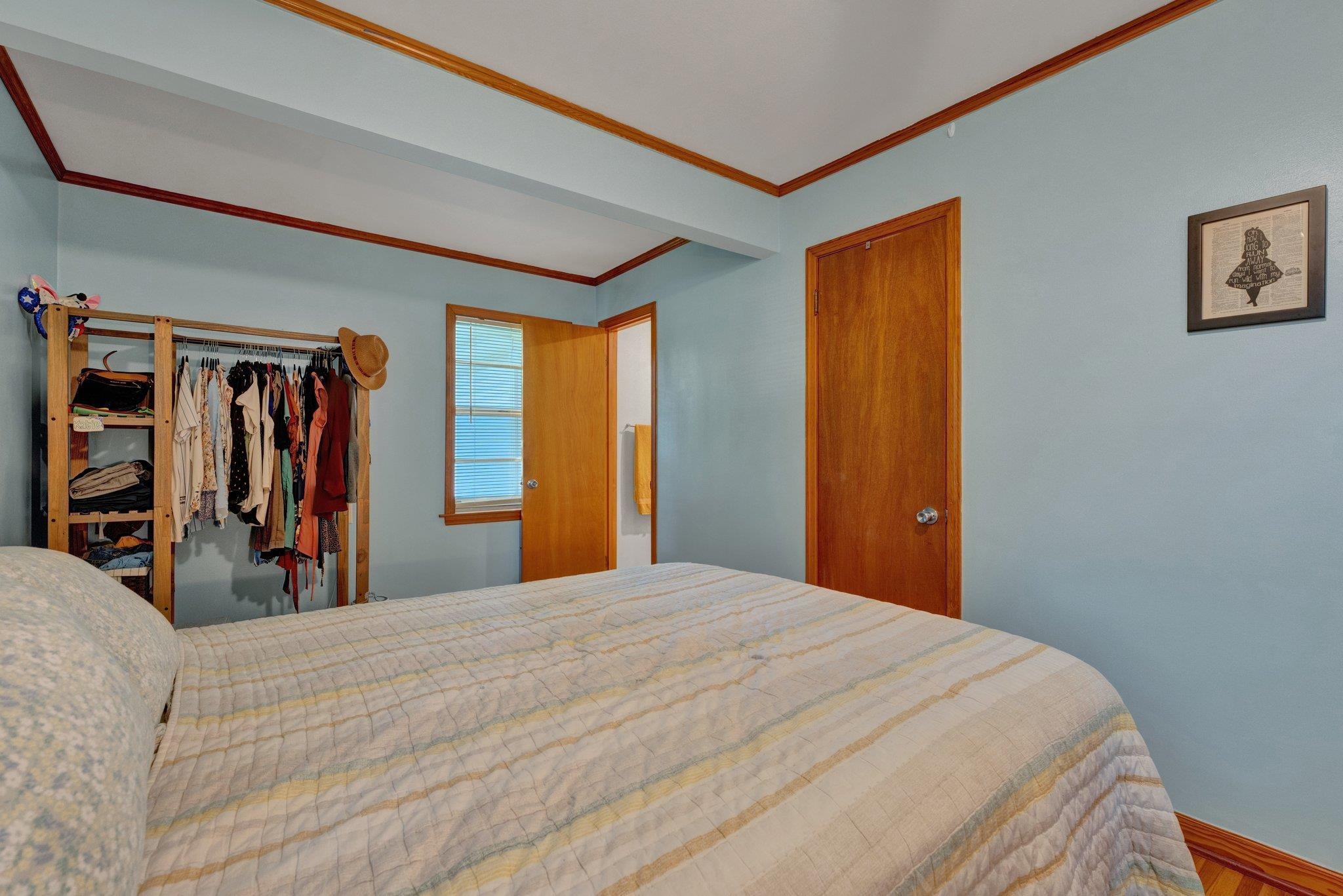 1585 Dearing Road Memphis, TN 38117 - Photo 11 of 34 a bed room with a bed and a walk in closet