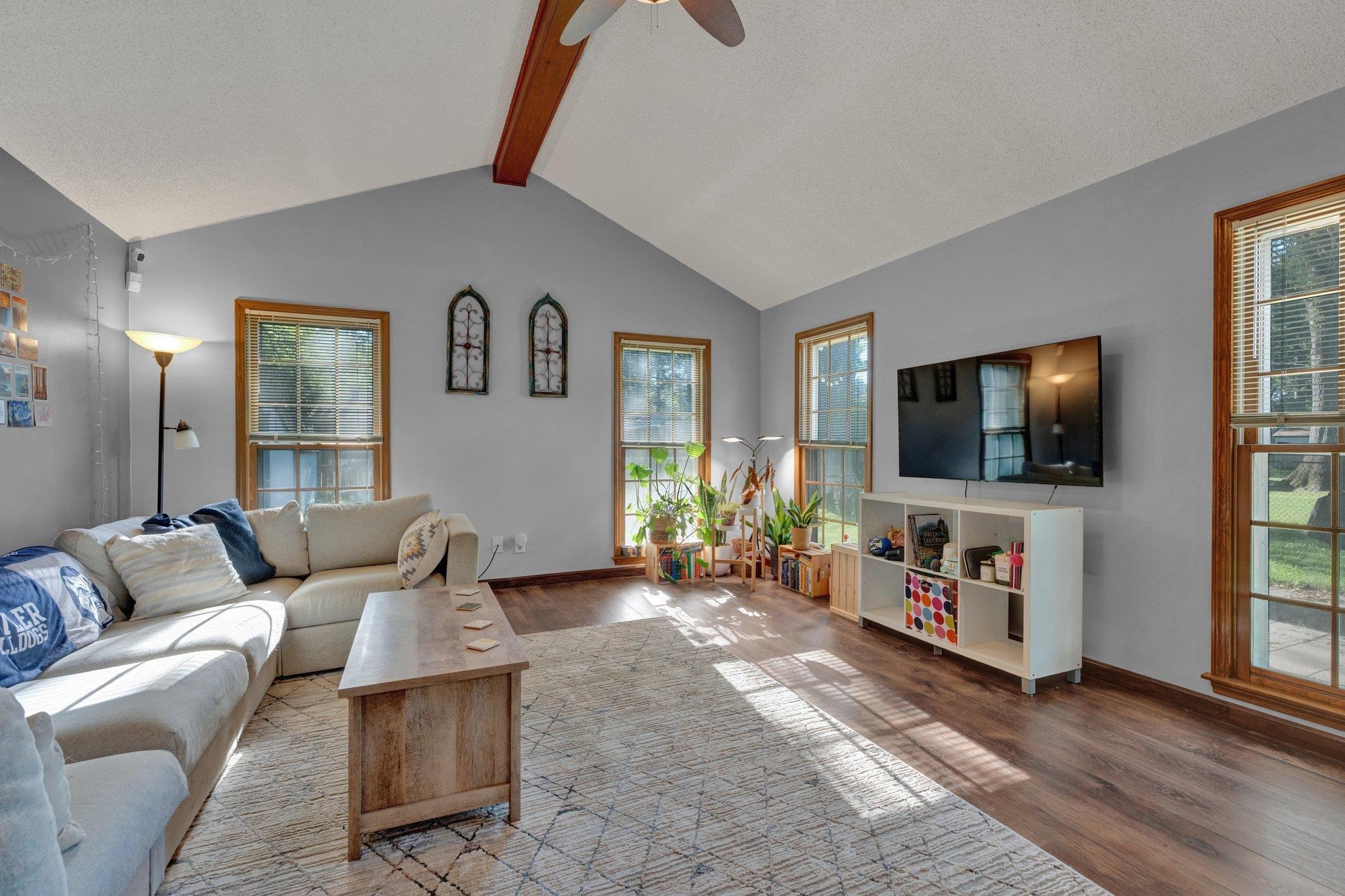 1585 Dearing Road Memphis, TN 38117 - Photo 24 of 34 a living room with furniture and a flat screen tv