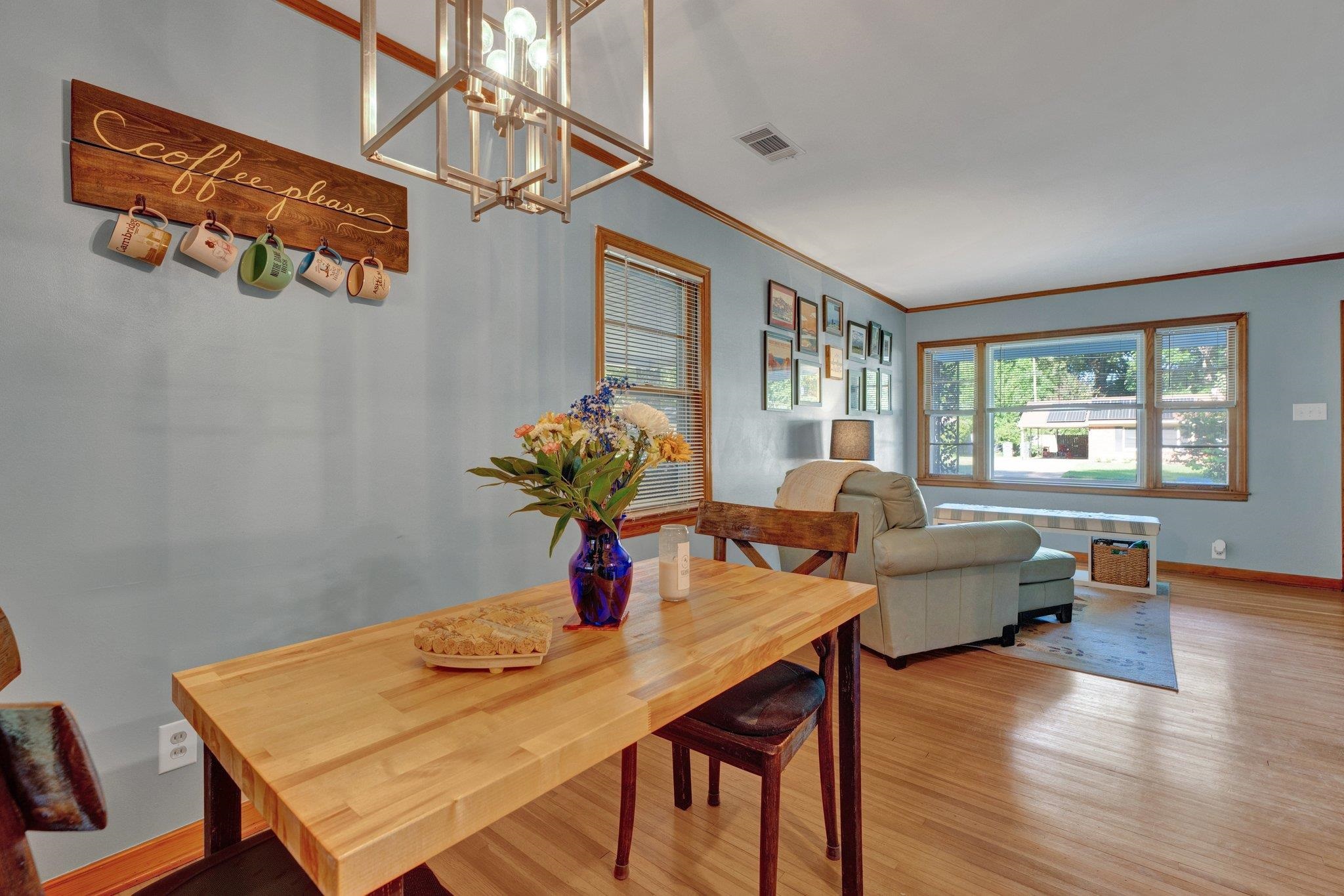 1585 Dearing Road Memphis, TN 38117 - Photo 6 of 34 a view of a dining room with furniture and wooden floor