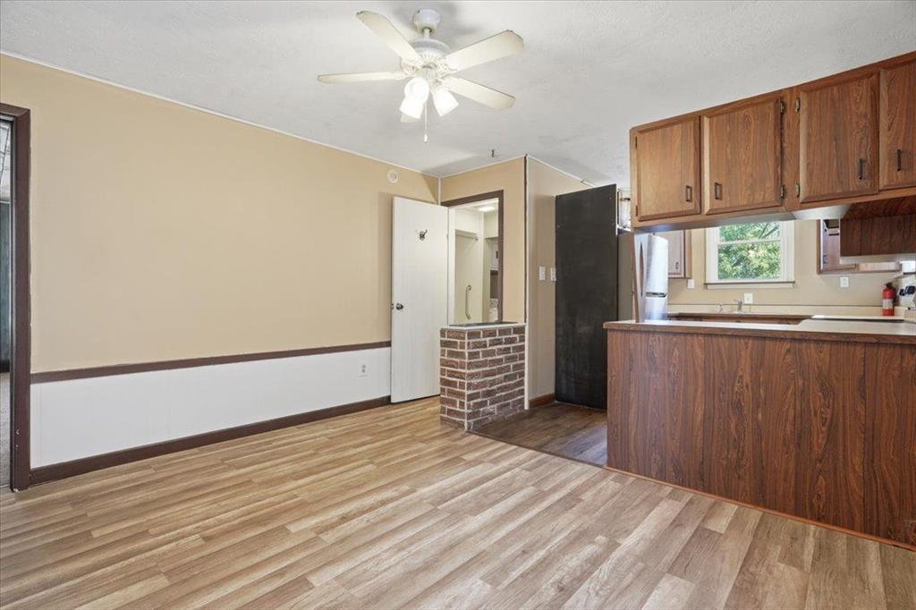 15 Division Street Pittsburgh, PA 15205 - Photo 23 of 44 a view of kitchen with wooden floor and electronic appliances