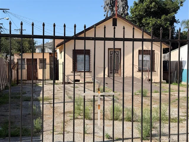a view of staircase with railing and trees