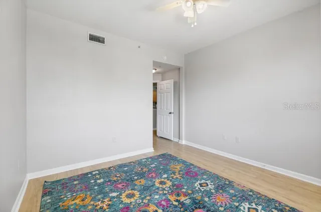 wooden floor in a room with a window