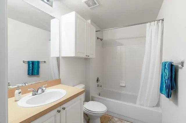 a view of a kitchen & utility room