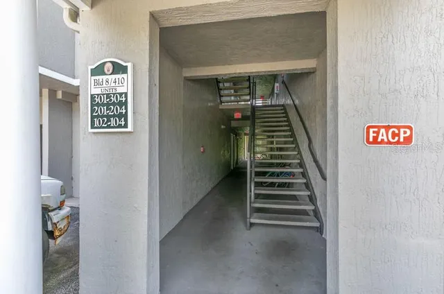 a view of a storage & utility room with dryer and washer