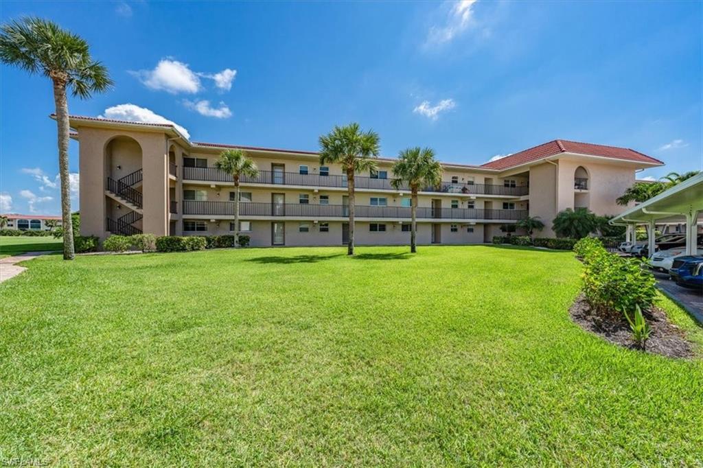 9 High Point Circle North, Unit 103 Naples, FL 34103 - Photo 1 of 24 Gallery Image 1