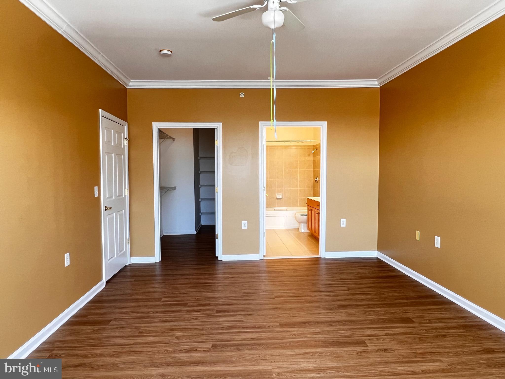 245 Masterson Court Ewing, NJ 08618 - Photo 14 of 25 a view of an empty room with wooden floor