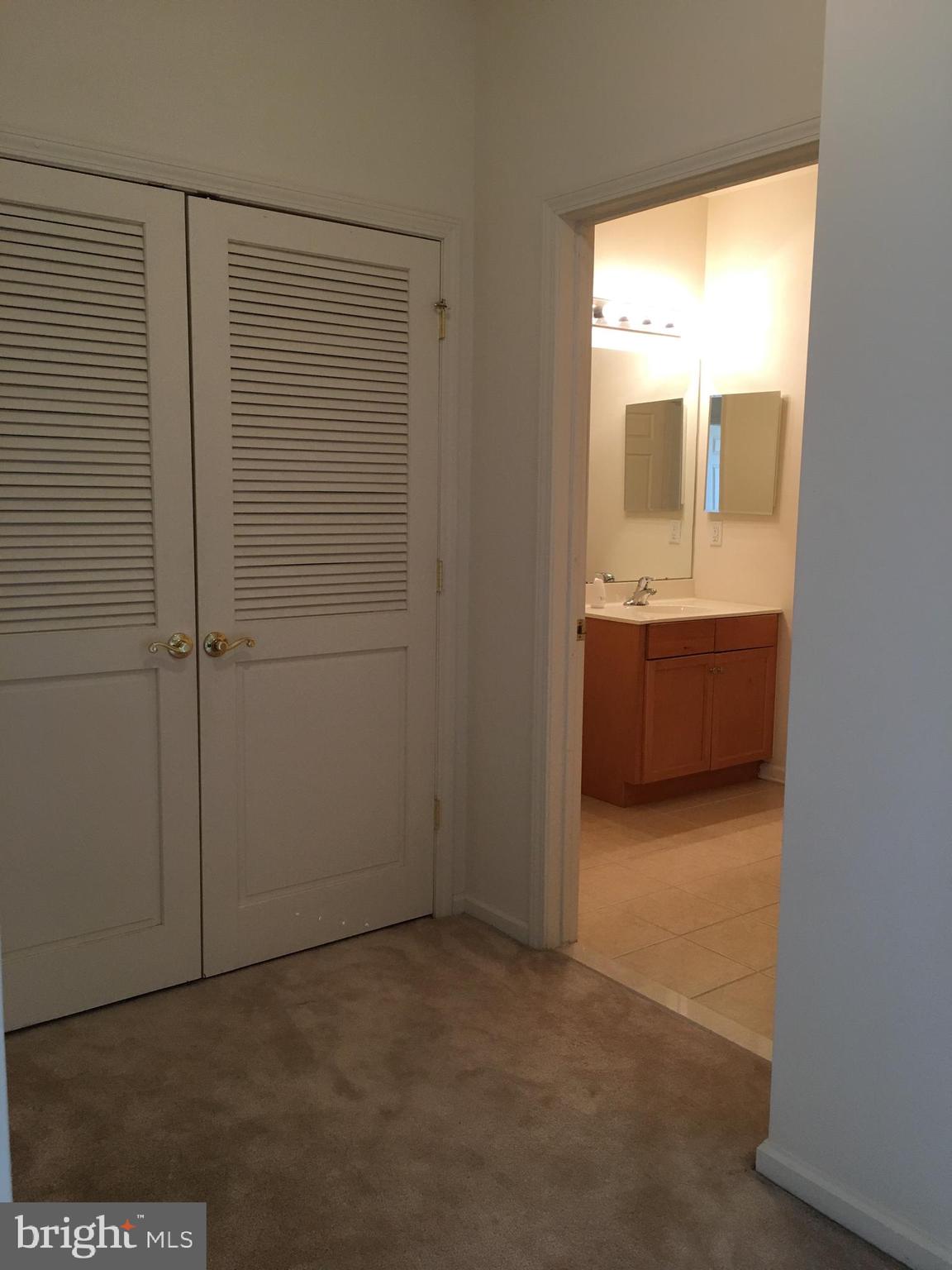 245 Masterson Court Ewing, NJ 08618 - Photo 14 of 21 a view of an empty room with a bathroom and a window