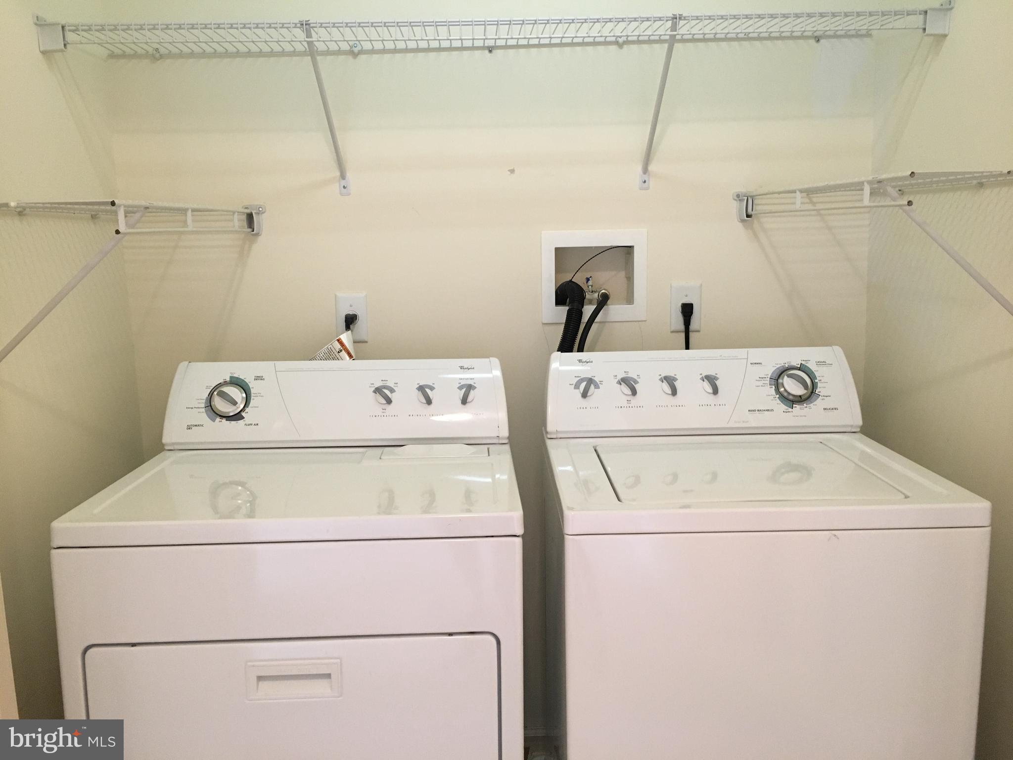245 Masterson Court Ewing, NJ 08618 - Photo 15 of 21 a utility room with dryer and washer