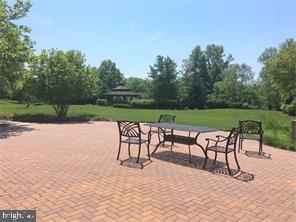 245 Masterson Court Ewing, NJ 08618 - Photo 20 of 21 a view of bench and trees in the background