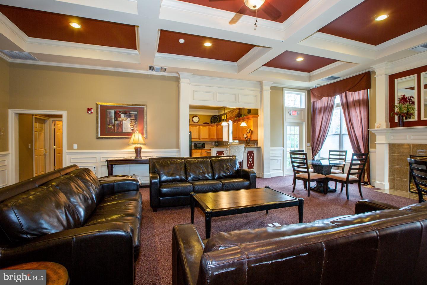 245 Masterson Court Ewing, NJ 08618 - Photo 23 of 25 a living room with furniture and large windows