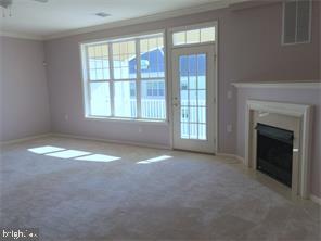 245 Masterson Court Ewing, NJ 08618 - Photo 6 of 21 a view of empty room with a fireplace