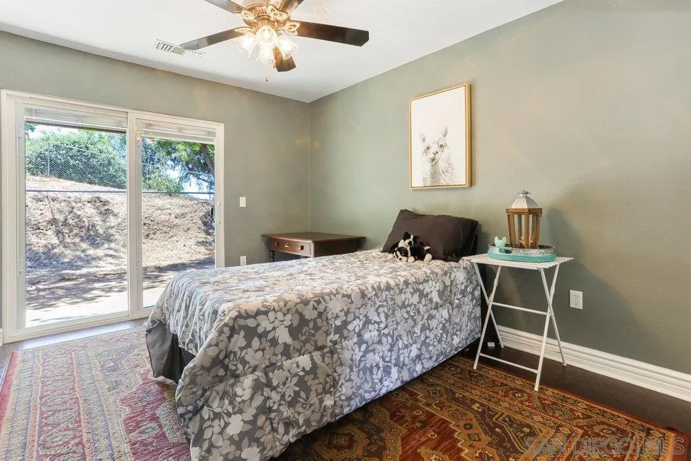 714 Steffy Road Ramona, CA 92065 - Photo 14 of 25 a bedroom with a bed and window