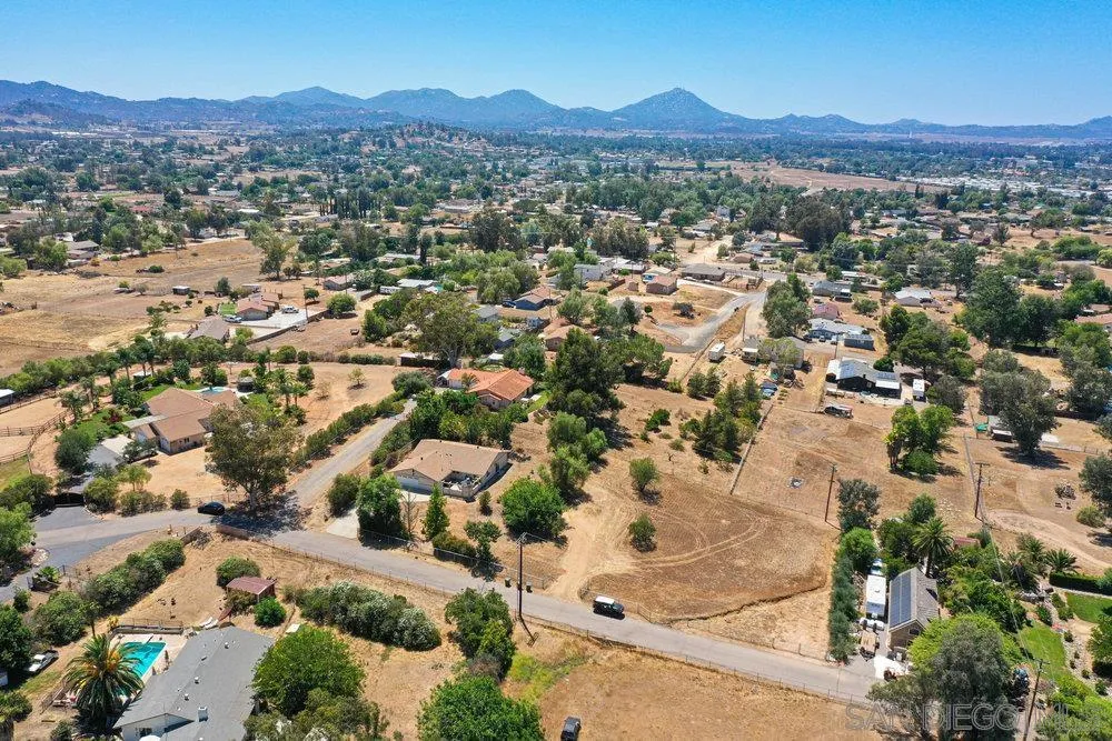 714 Steffy Road Ramona, CA 92065 - Photo 24 of 25 an aerial view of residential houses with outdoor space and trees