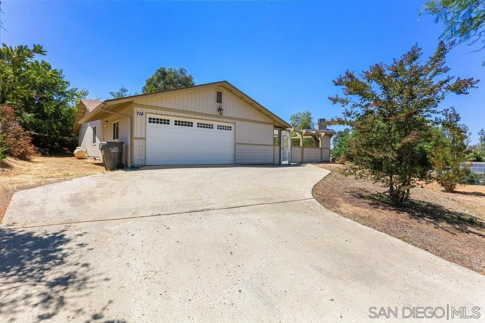 714 Steffy Road Ramona, CA 92065 - Photo 4 of 25 a front view of a house with a yard