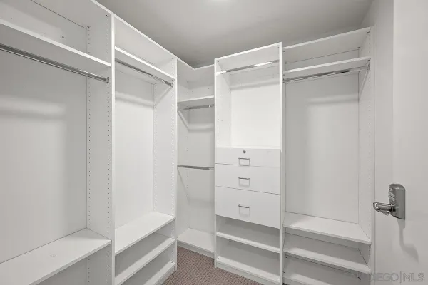 a view of a balcony with an outdoor seating