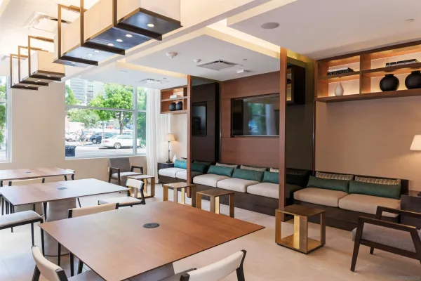 a view of swimming pool with seating area and furniture