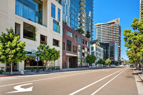a swimming pool with outdoor seating and yard