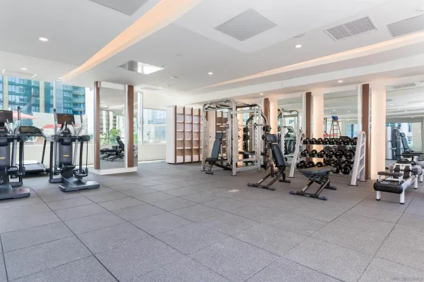 a swimming pool with outdoor seating