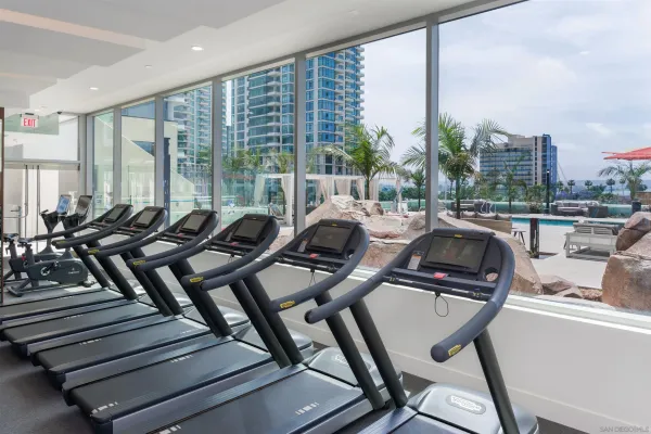 a swimming pool with outdoor seating and yard