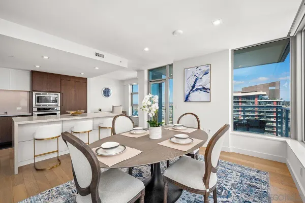 a view of a dining room with furniture
