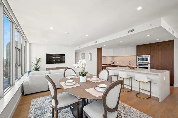 a kitchen with stainless steel appliances a refrigerator and stove