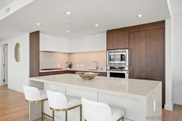 a kitchen with a stove and a sink