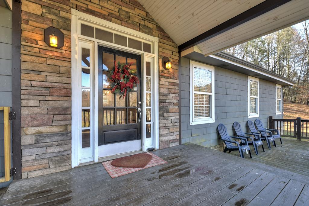 10266 Boardtown Road Cherry Log, GA 30522 - Photo 11 of 40 a view of living room filled with furniture and wooden floor
