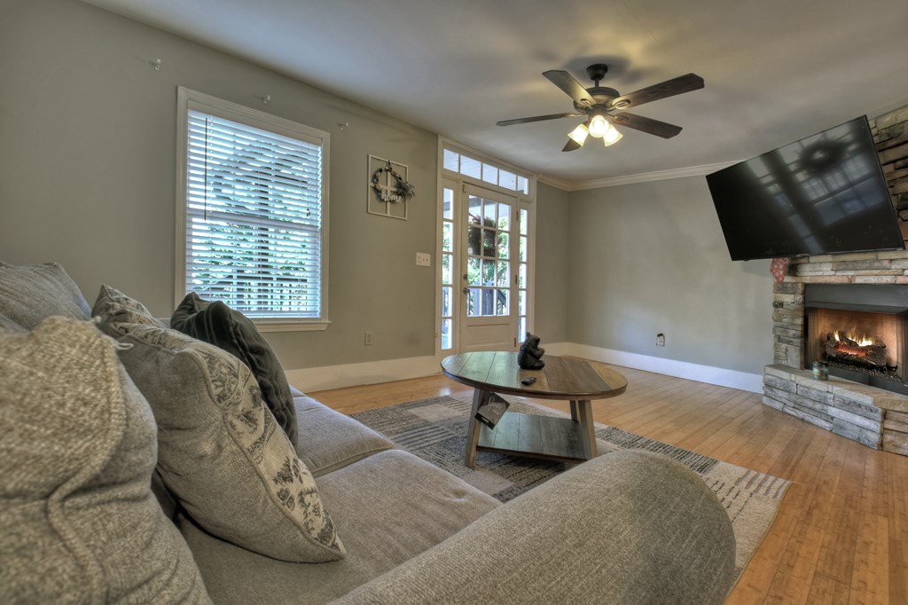 10266 Boardtown Road Cherry Log, GA 30522 - Photo 16 of 40 a living room with furniture and a fireplace