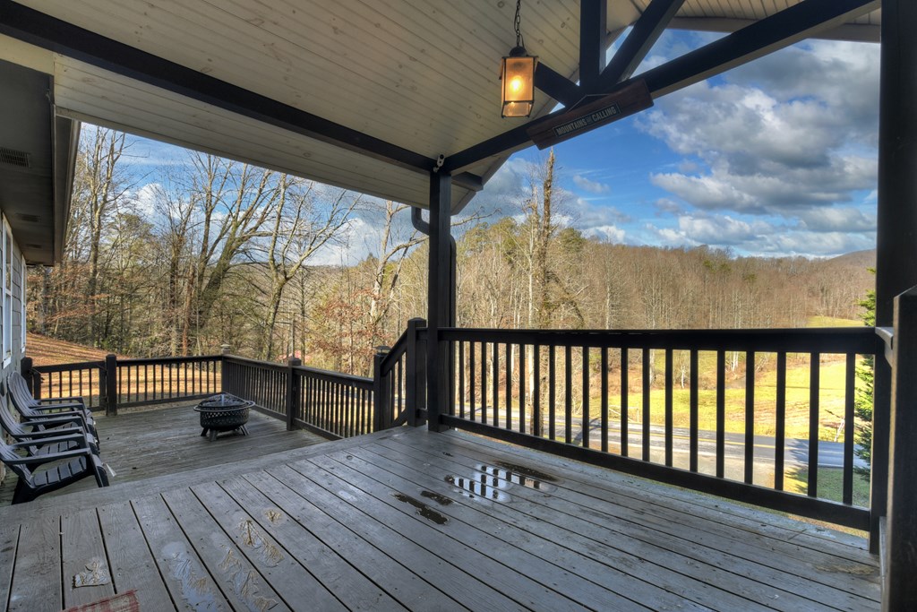 10266 Boardtown Road Cherry Log, GA 30522 - Photo 32 of 40 a balcony with wooden floor