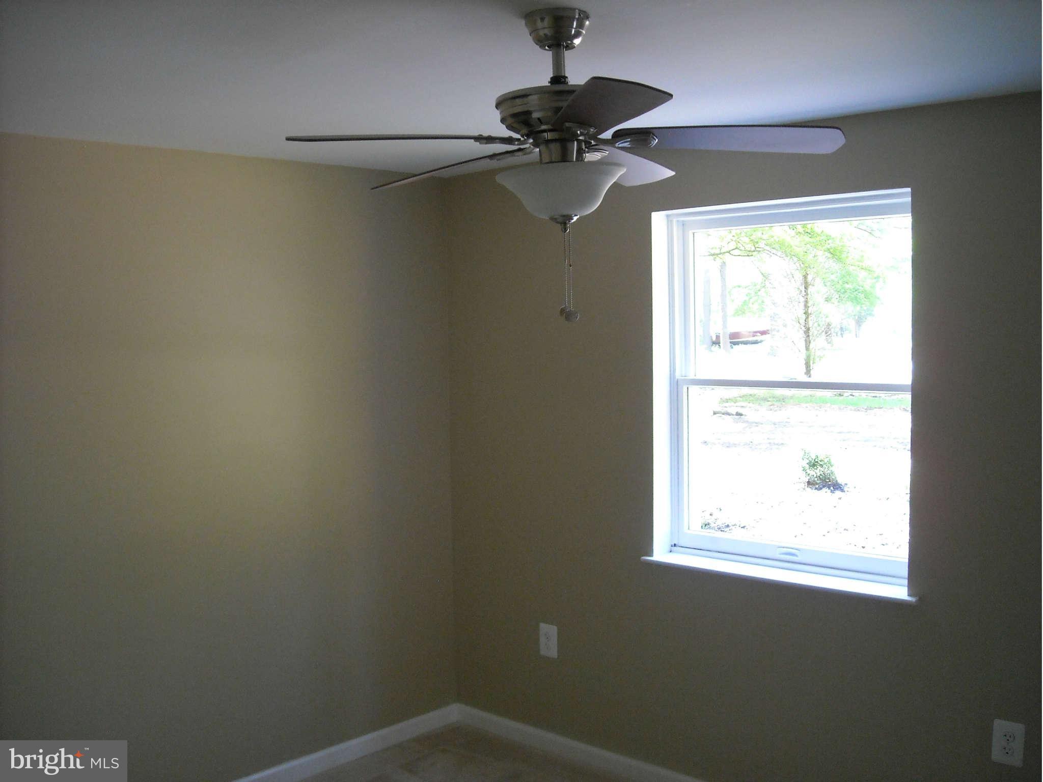 13630 Hamit Road Dowell, MD 20688 - Photo 12 of 12 a view of a room that has a window in it