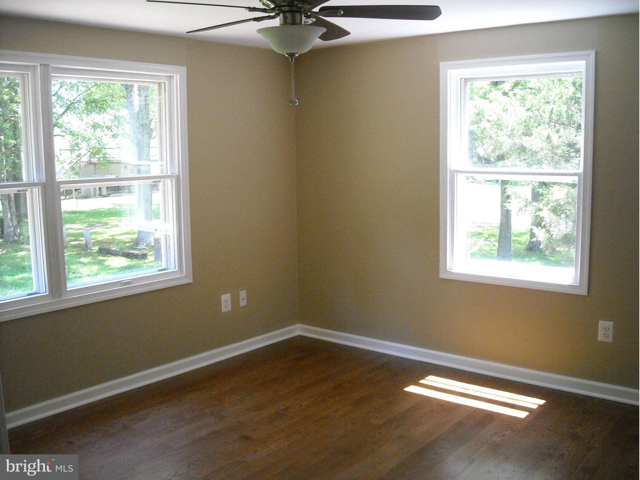 13630 Hamit Road Dowell, MD 20688 - Photo 5 of 12 a view of a livingroom with a window