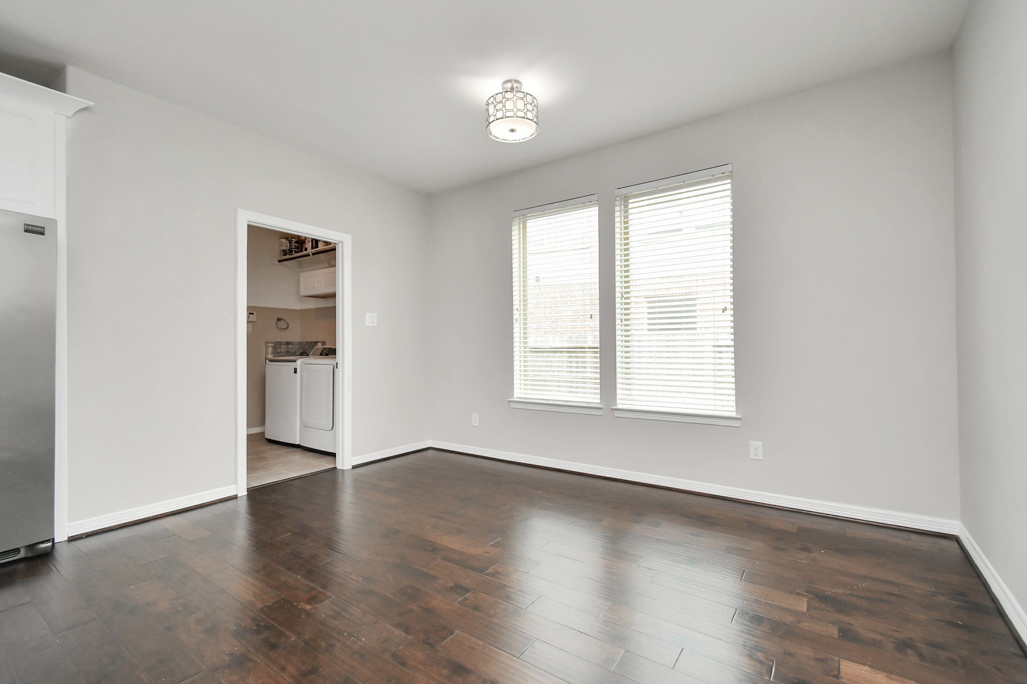 3803 May Ridge Lane Sugar Land, TX 77479 - Photo 24 of 47 an empty room with wooden floor and windows