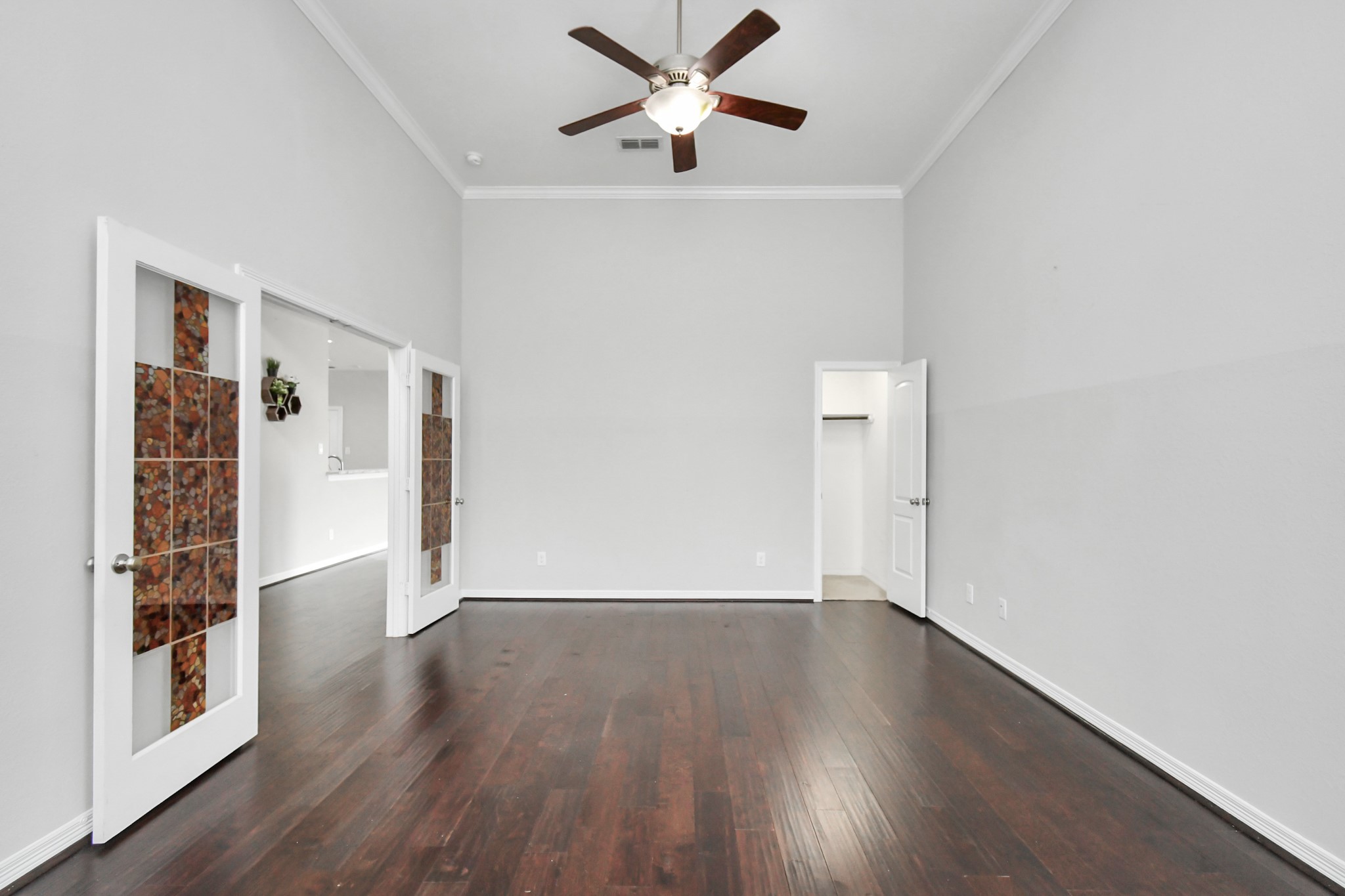 3803 May Ridge Lane Sugar Land, TX 77479 - Photo 28 of 47 an empty room with wooden floor closet and windows