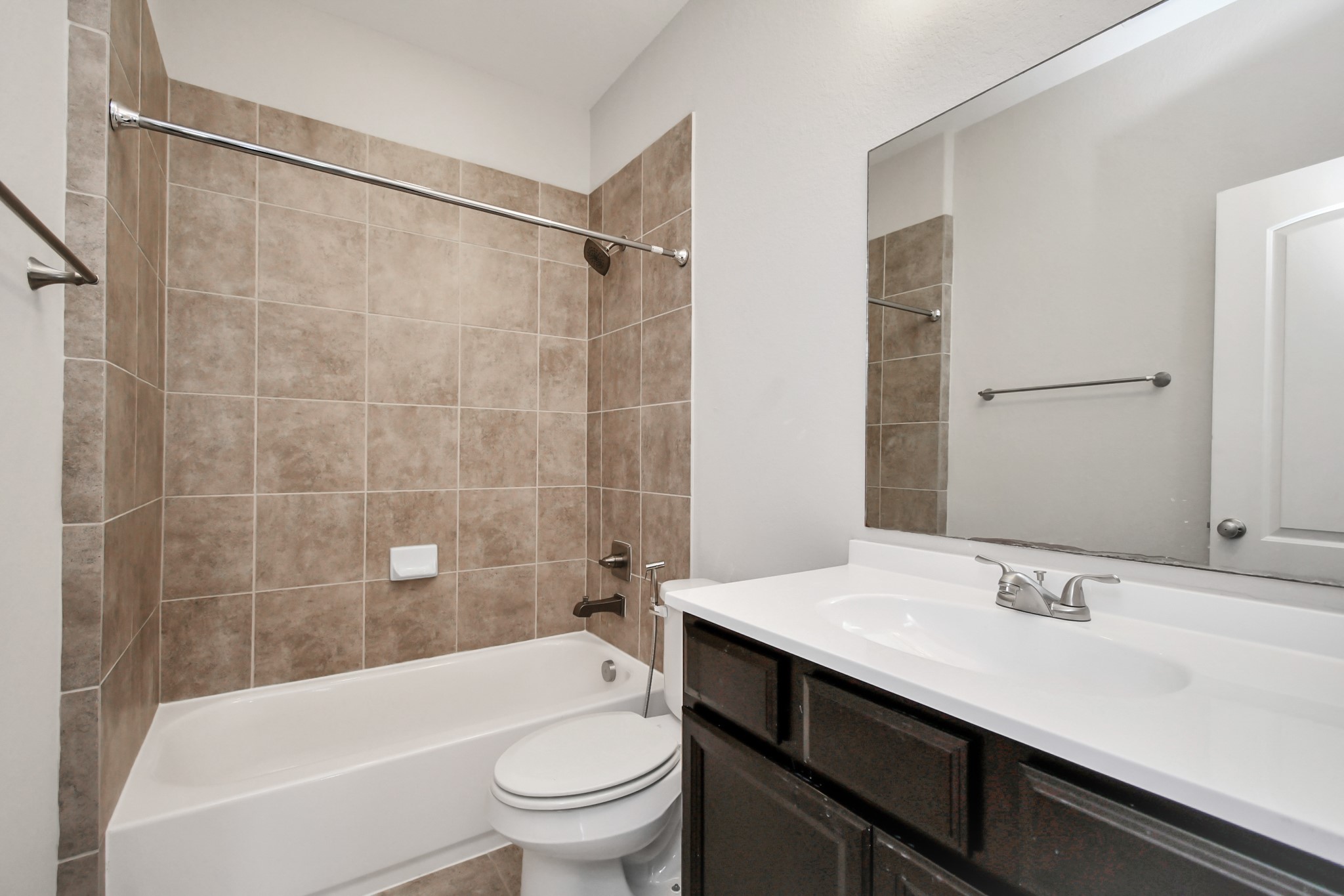 3803 May Ridge Lane Sugar Land, TX 77479 - Photo 39 of 47 a bathroom with a sink a toilet and bathtub