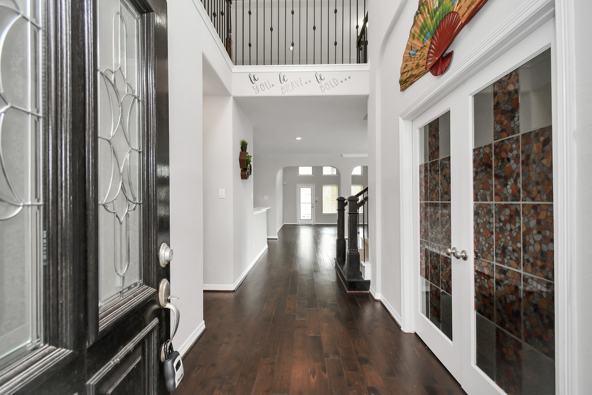 3803 May Ridge Lane Sugar Land, TX 77479 - Photo 4 of 47 a view of gallery with wooden floor