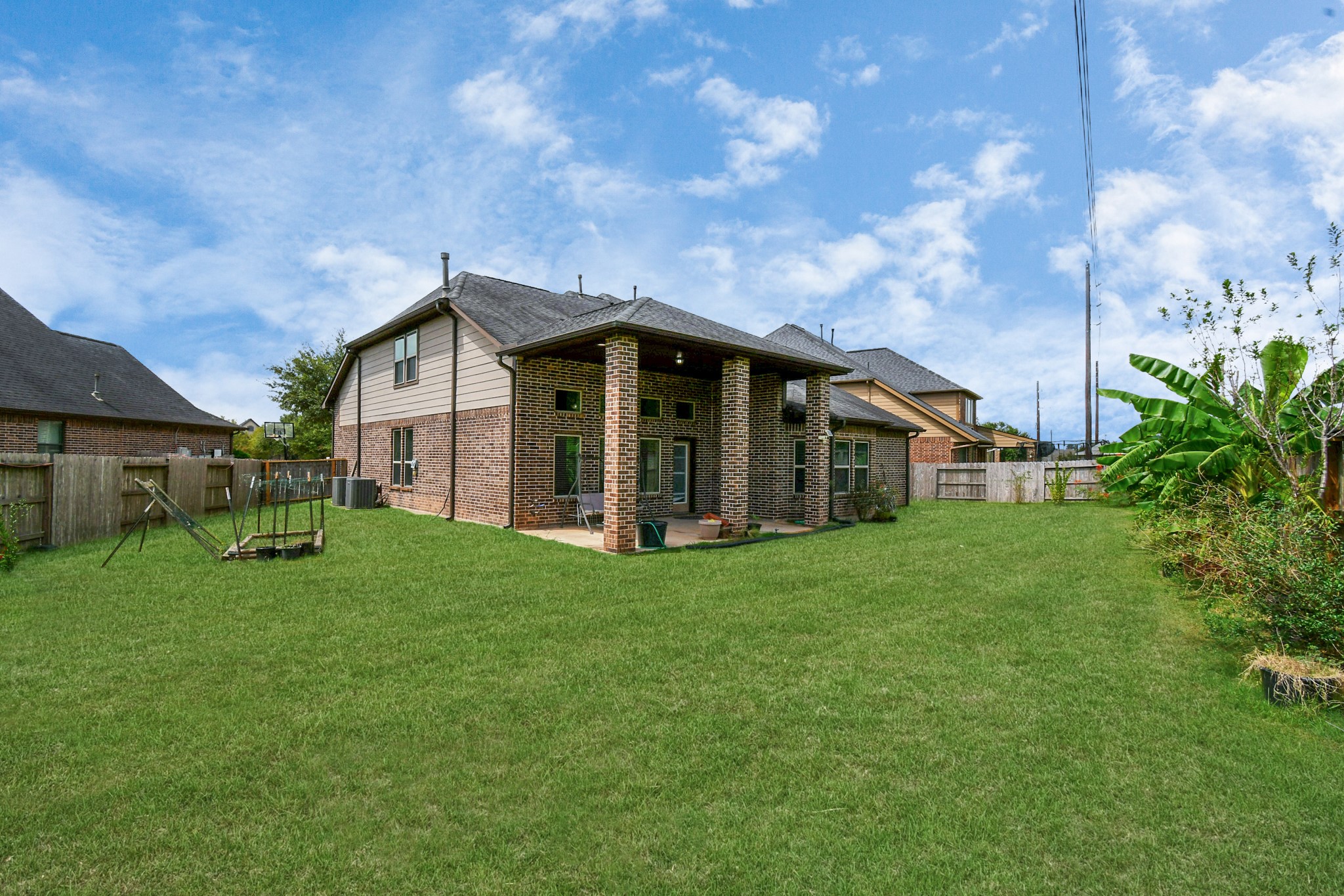 3803 May Ridge Lane Sugar Land, TX 77479 - Photo 46 of 47 a view of a house with backyard and garden