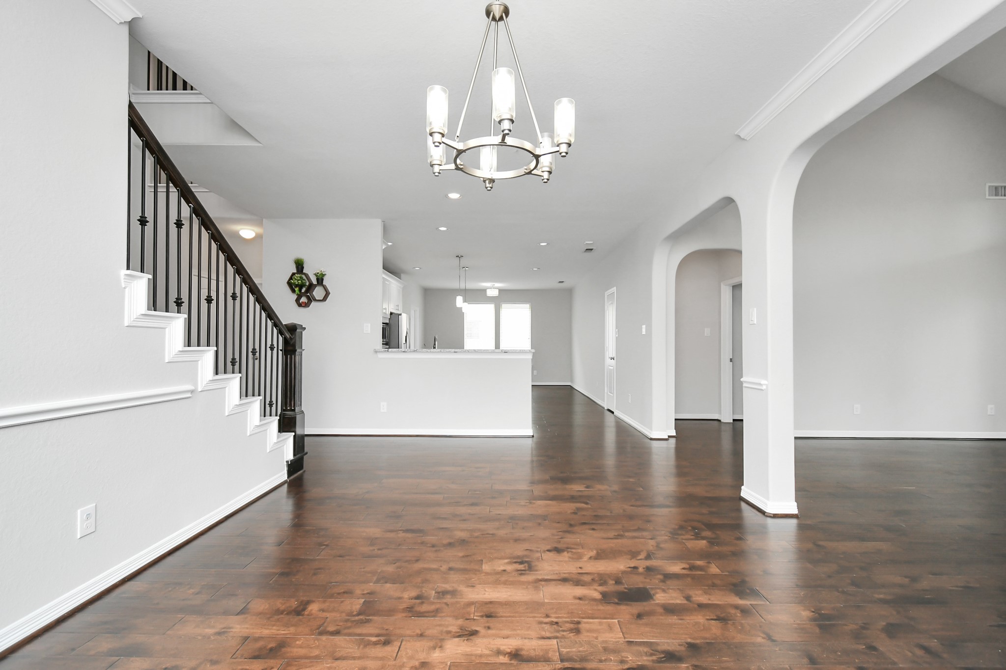 3803 May Ridge Lane Sugar Land, TX 77479 - Photo 9 of 47 a view of an entryway with wooden floor and staircase