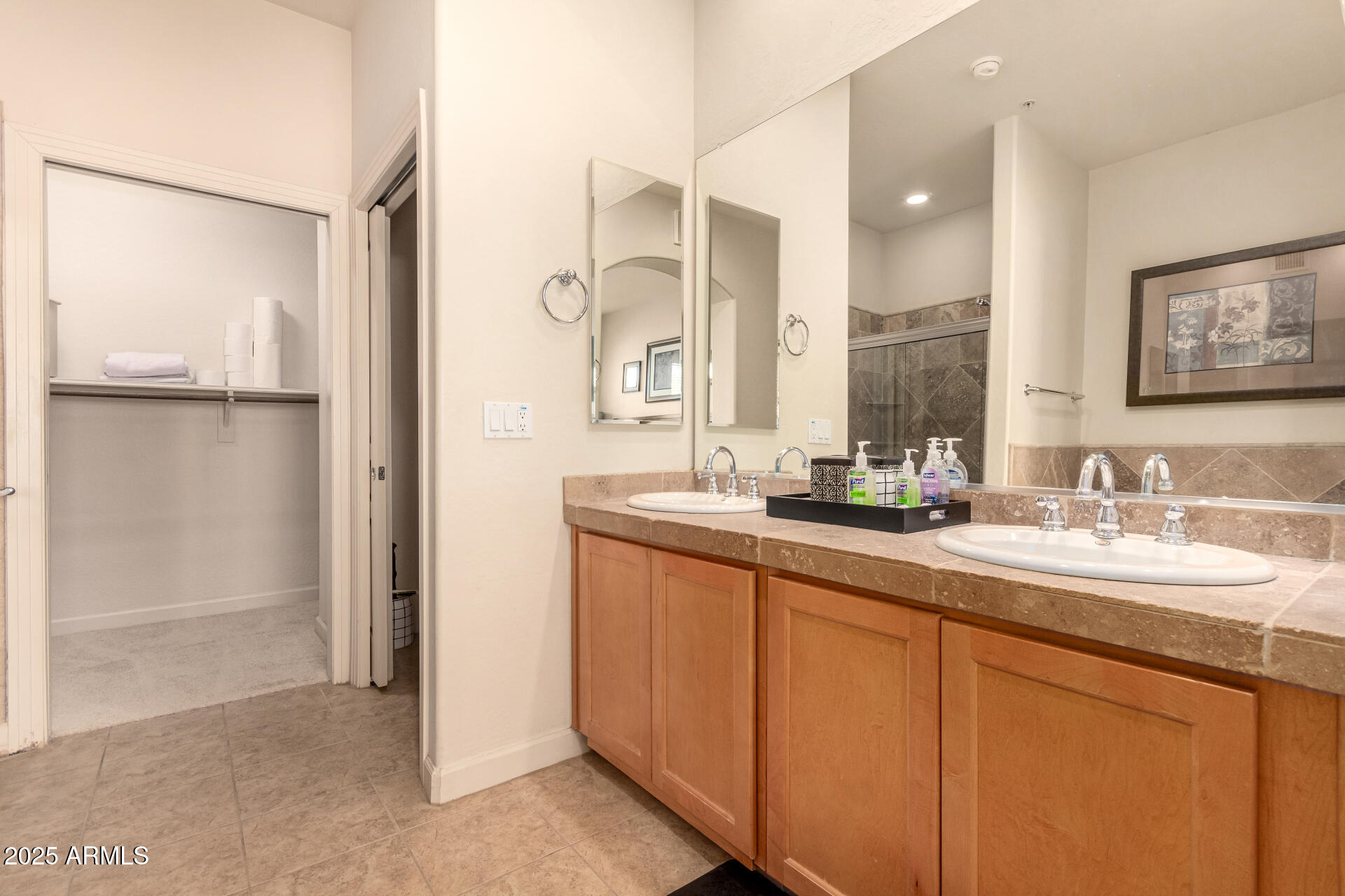 20750 North 87th Street, Unit 1065 Scottsdale, AZ 85255 - Photo 14 of 29 a bathroom with a double vanity sink mirror and double
