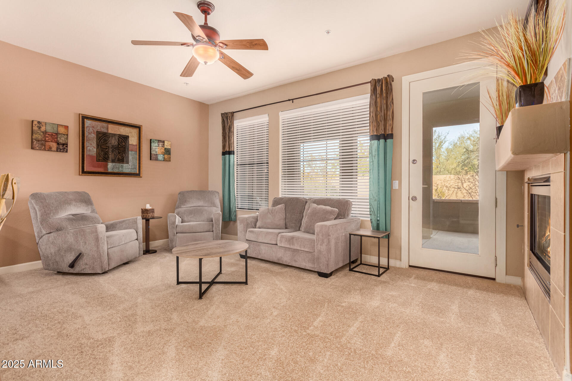 20750 North 87th Street, Unit 1065 Scottsdale, AZ 85255 - Photo 5 of 29 a living room with furniture and a fireplace