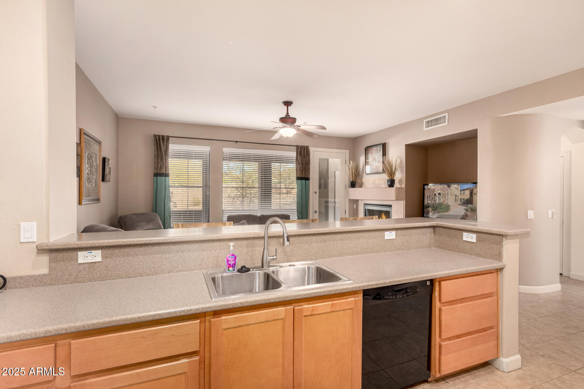 20750 North 87th Street, Unit 1065 Scottsdale, AZ 85255 - Photo 7 of 29 a kitchen with sink stove and cabinets
