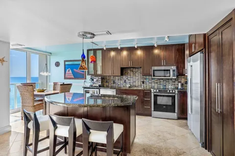 a view of dining area with lots of tables and chairs
