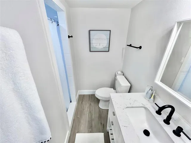 a bathroom with a sink and a toilet