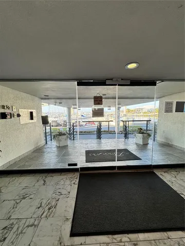 a kitchen with counter top and outdoor space