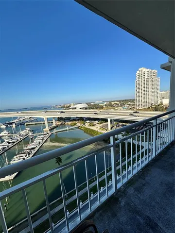 a view of a balcony with city view